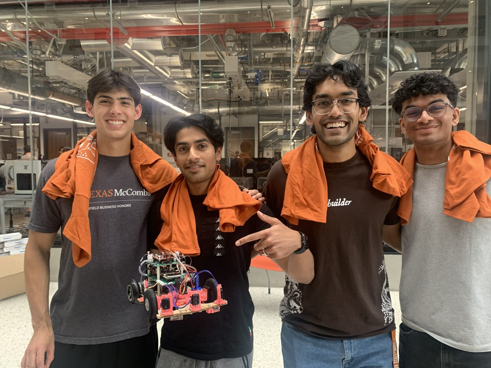 The team on race day, with Elijah Silguero, Aditya Pulipaka, and Rayan Ahmed.